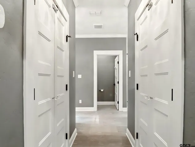 a view of a bathroom with a shower and a sink