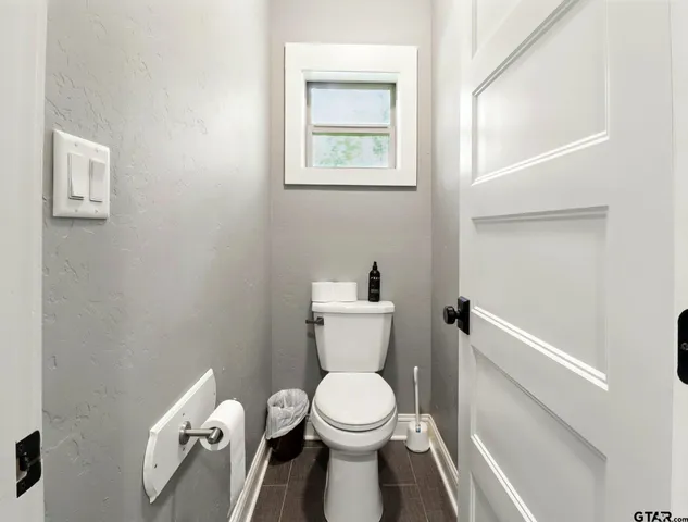 a outdoor living space with furniture and a rug