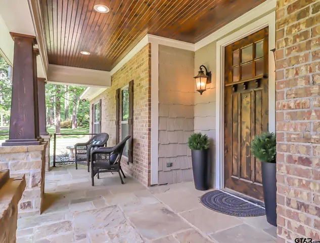 a view of living room filled with furniture
