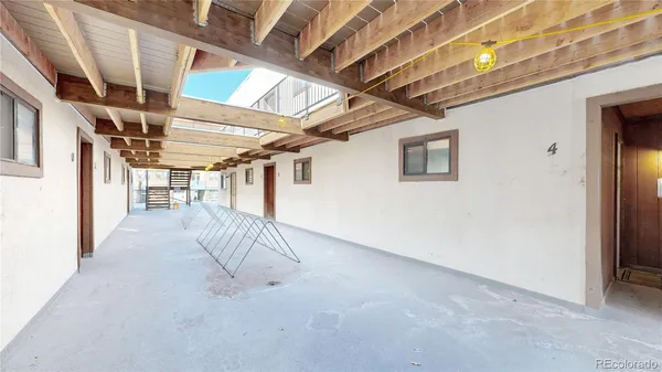a view of a room with wooden walls