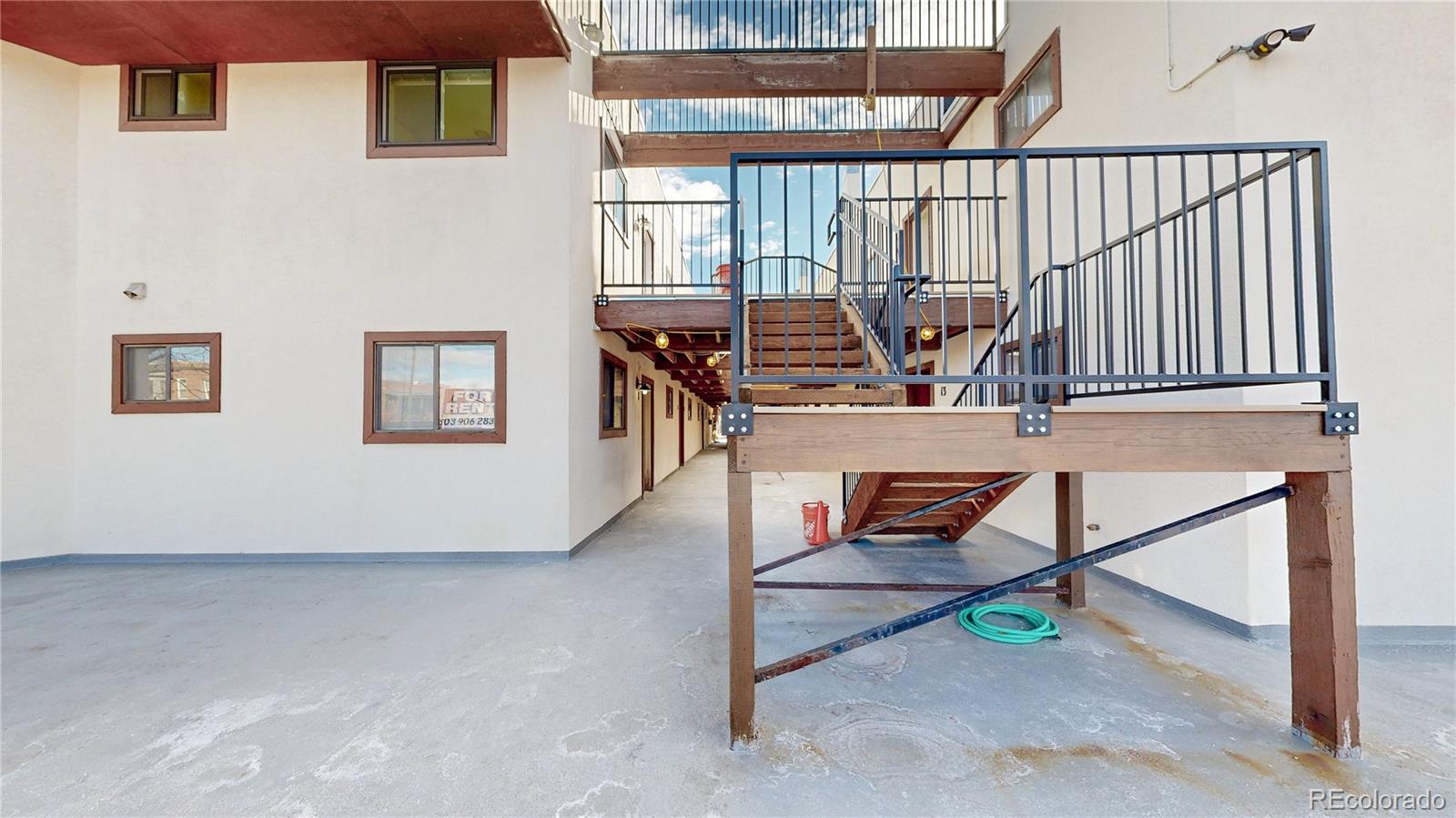 1934 18th Street, Unit 8 Boulder, CO 80302 - Photo 25 of 41 a view of staircase with a table and chairs
