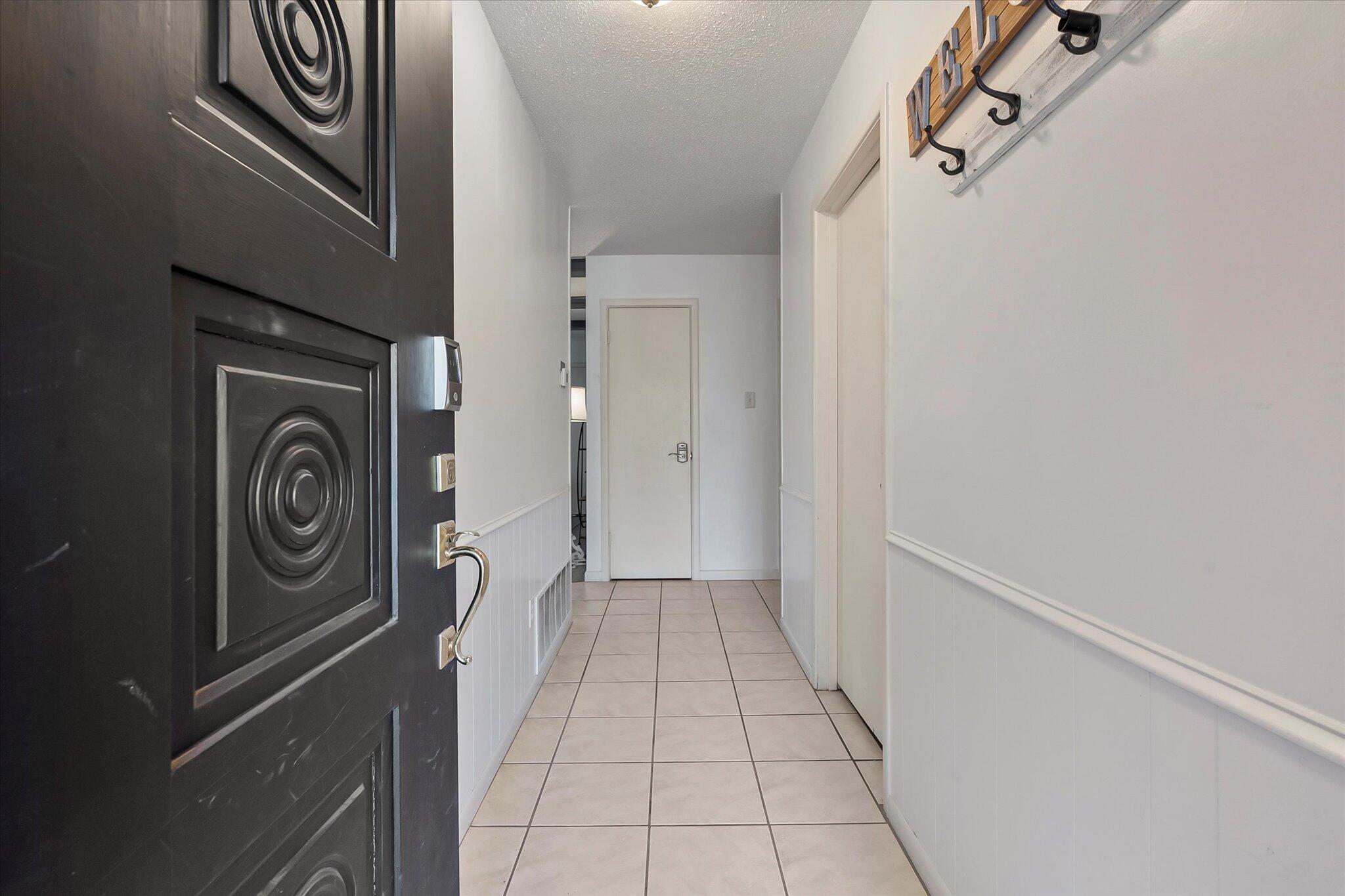 4904 15th Street Lubbock, TX 79416 - Photo 4 of 29 a view of a storage & utility room with a sink
