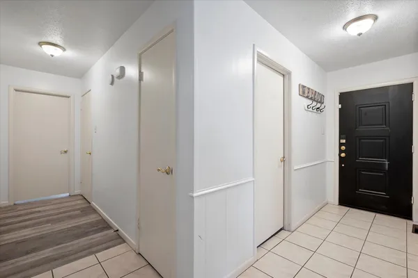 a bathroom with a shower and a sink