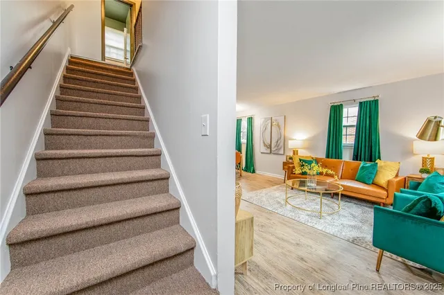 a bathroom with a sink mirror and toilet