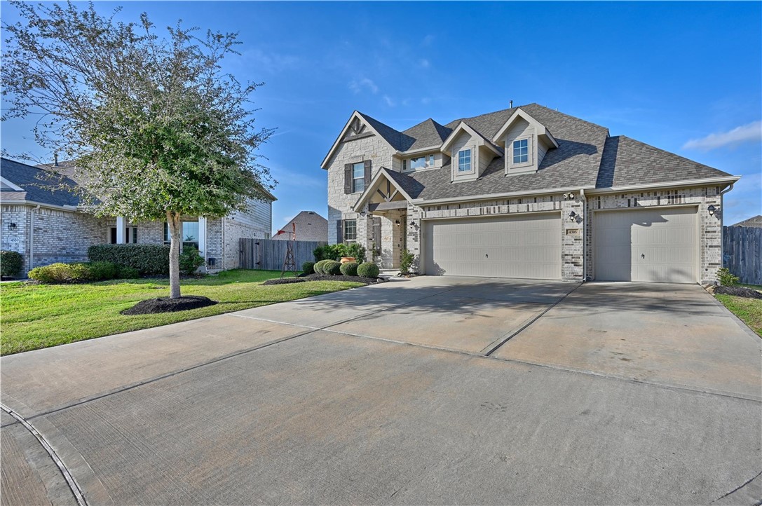 4316 Mocking Run Lane Dickinson, TX 77539 - Photo 24 of 24 front view of a house with a yard