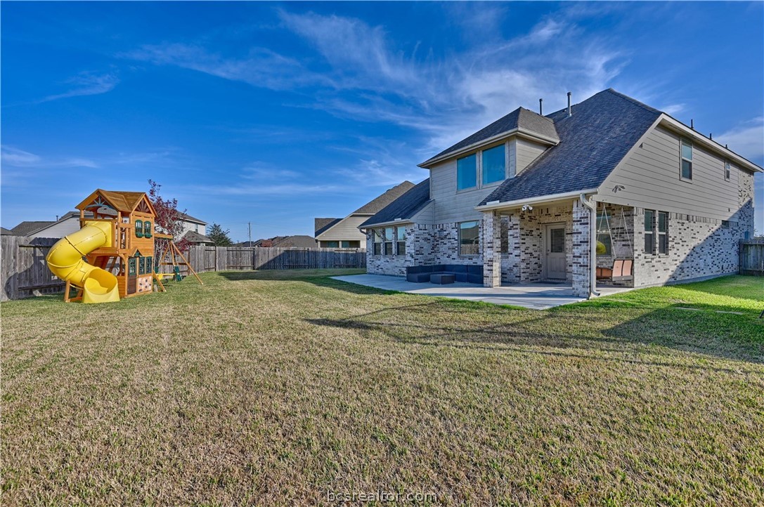 4316 Mocking Run Lane Dickinson, TX 77539 - Photo 4 of 24 a view of a house with a backyard porch and furniture