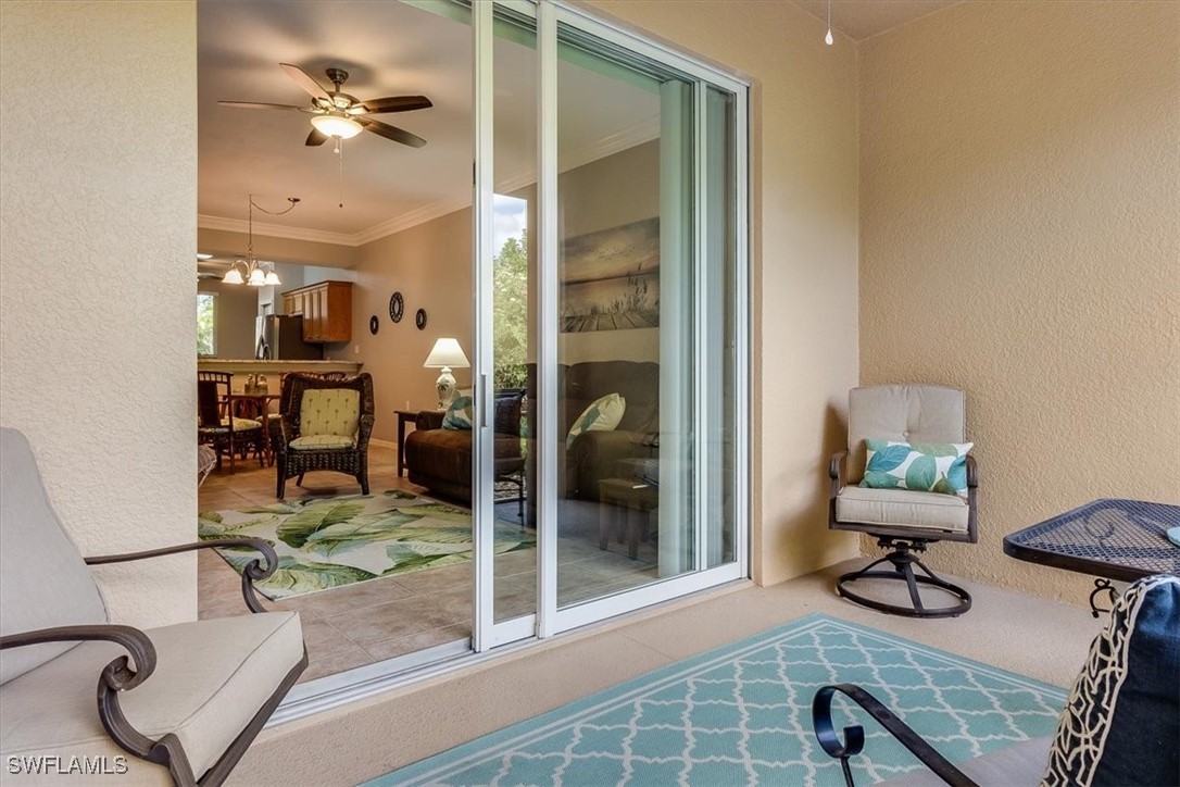 8251 Pathfinder Loop, Unit 615 Fort Myers, FL 33919 - Photo 18 of 44 a view of hall way with furniture