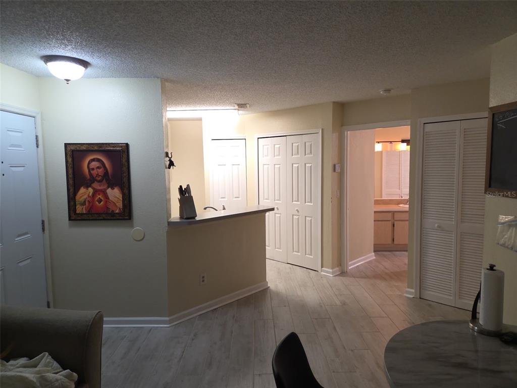 3705 Southwest 27th Street, Unit 422 Gainesville, FL 32608 - Photo 12 of 25 a view of a hallway with closet