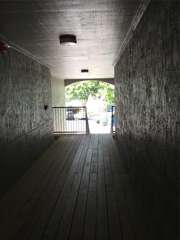 3705 Southwest 27th Street, Unit 422 Gainesville, FL 32608 - Photo 2 of 25 a view of balcony with wooden floor