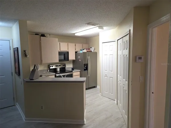 a bathroom with a sink toilet and mirror