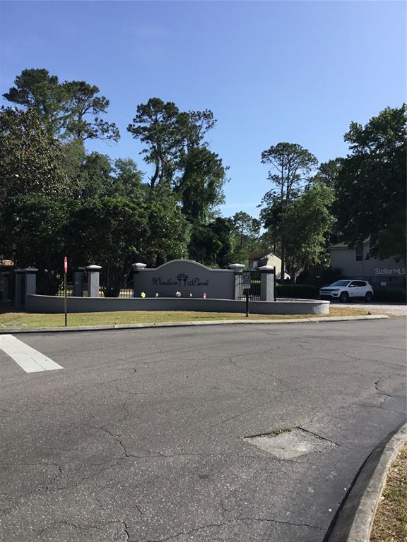 3705 Southwest 27th Street, Unit 422 Gainesville, FL 32608 - Photo 7 of 25 a view of street with houses