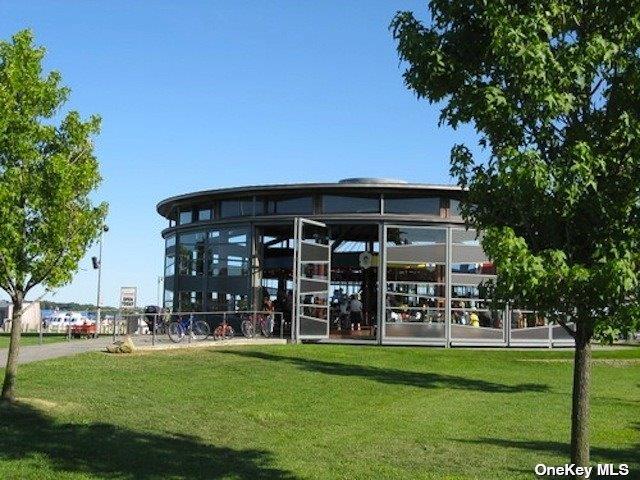 165 Sterling Street Greenport, NY 11944 - Photo 16 of 18 a view of a house with a yard