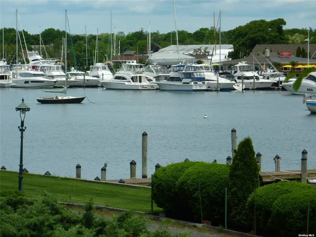a group of boats are docked in a harbor