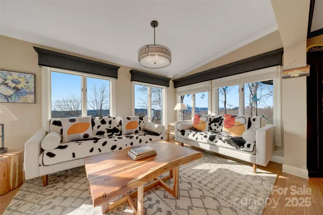 a view of a balcony with chairs