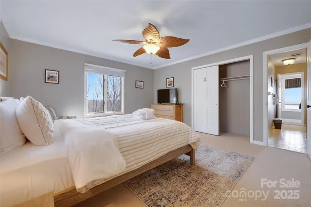 a bathroom with a granite countertop sink a toilet and a mirror