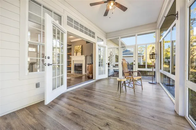 a kitchen with kitchen island granite countertop a sink cabinets and stainless steel appliances