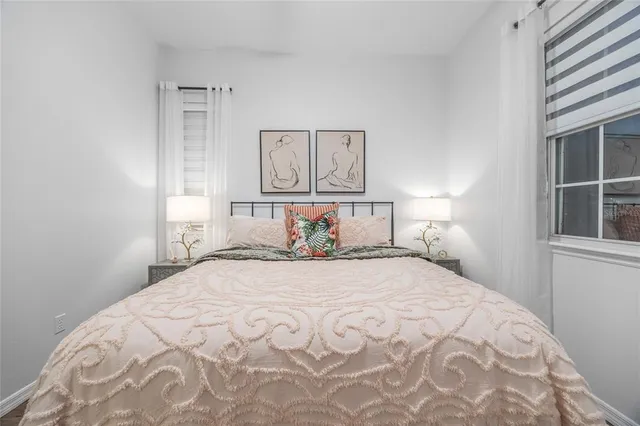 an aerial view of a house with a swimming pool