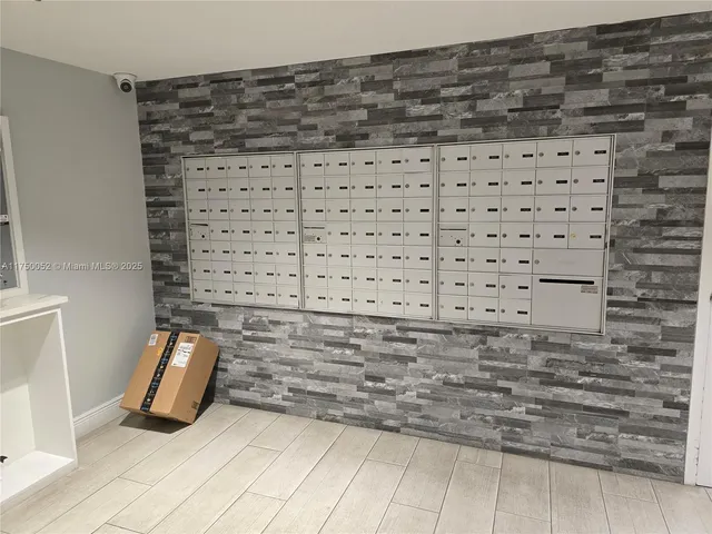 a view of parking garage with cars