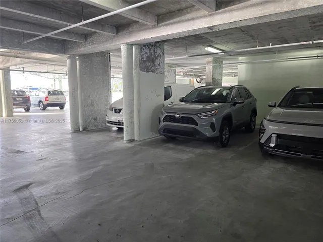 a kitchen with a stove and a refrigerator