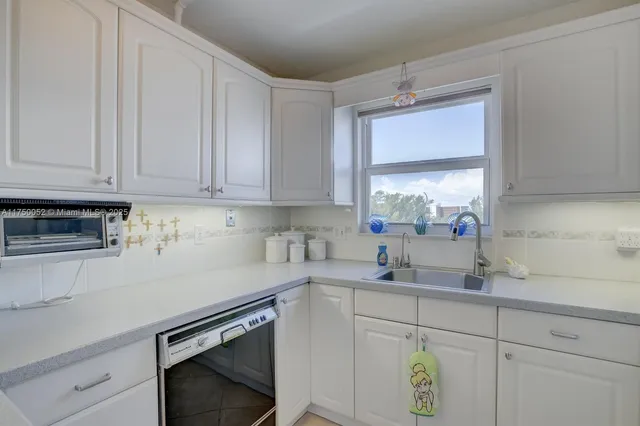 a bedroom with a bed furniture and window