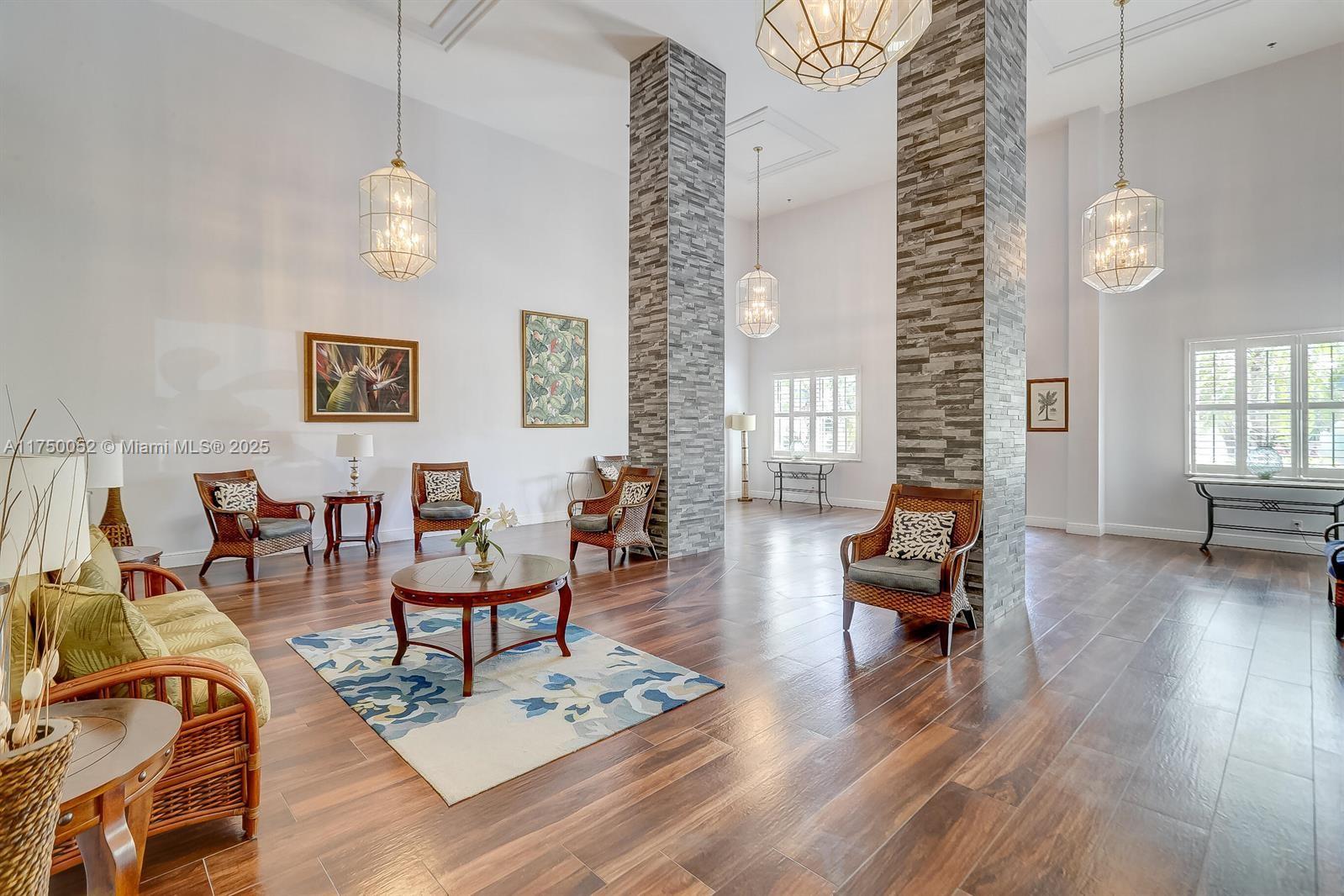 1505 North Riverside Drive, Unit 604 Pompano Beach, FL 33062 - Photo 36 of 50 a living room with furniture windows and wooden floor