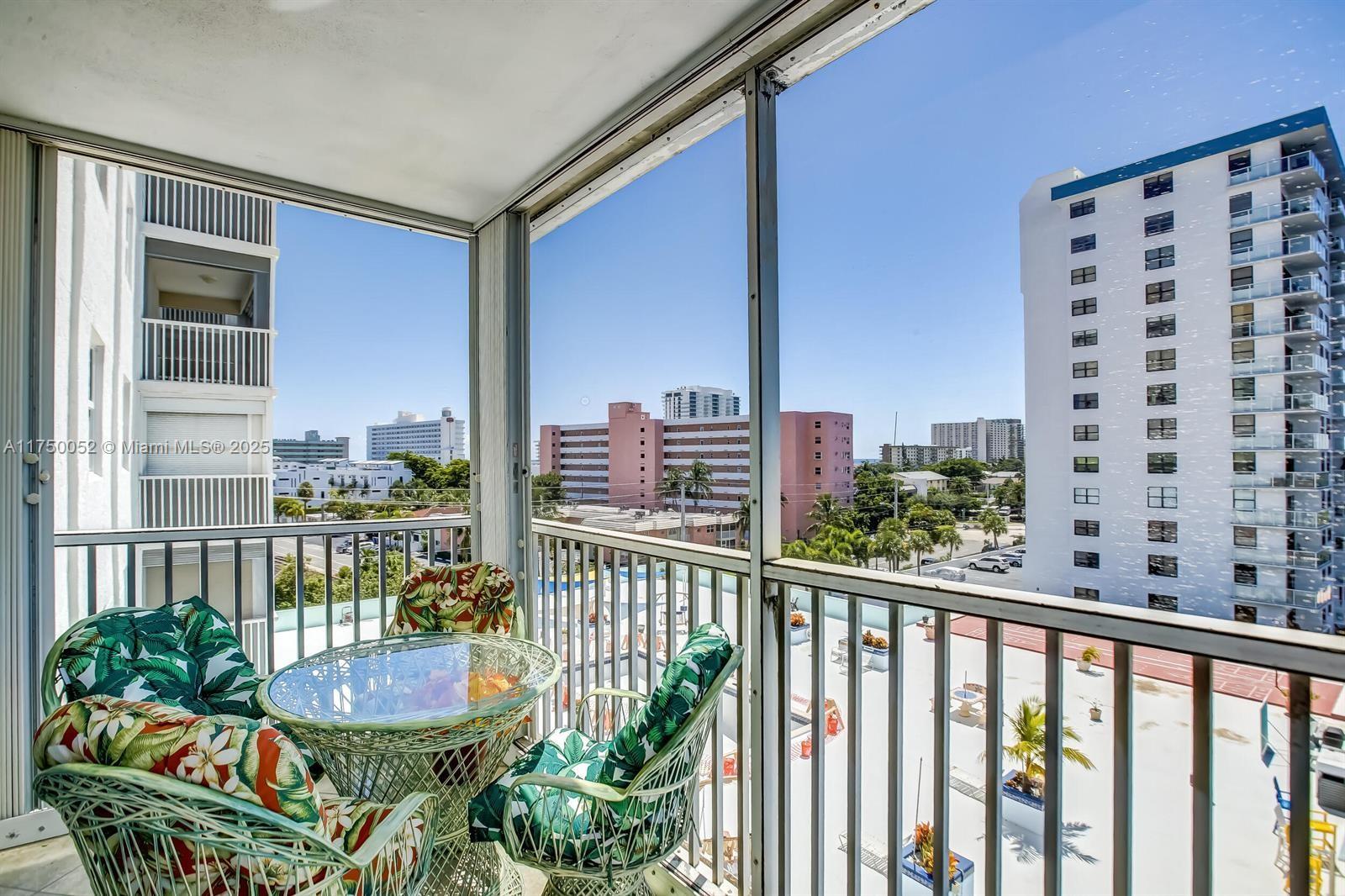 1505 North Riverside Drive, Unit 604 Pompano Beach, FL 33062 - Photo 6 of 50 a view of a chairs and table in the balcony