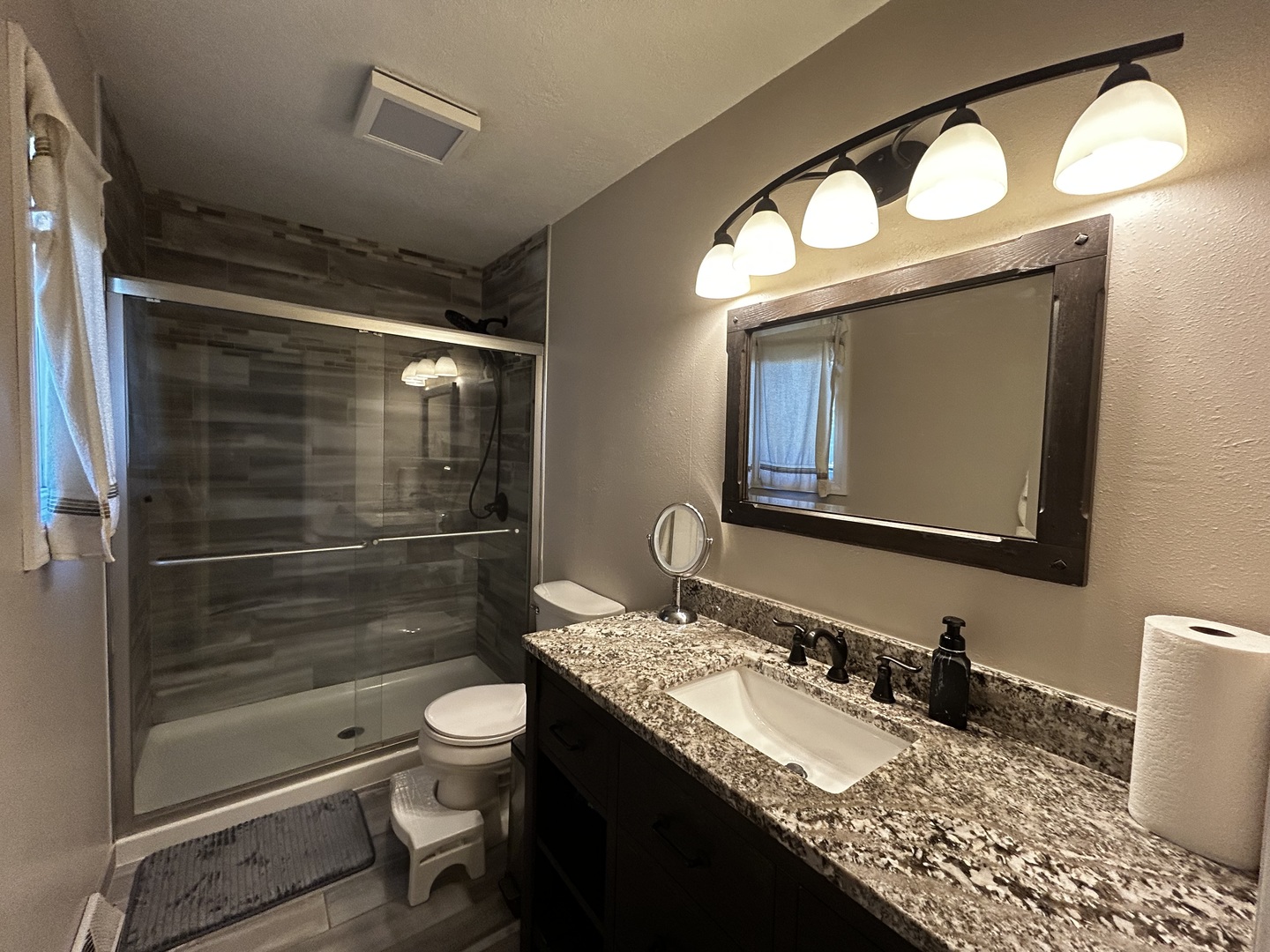 12795 Lawrence Road Sterling, IL 61081 - Photo 25 of 42 a bathroom with a granite countertop sink toilet and a mirror