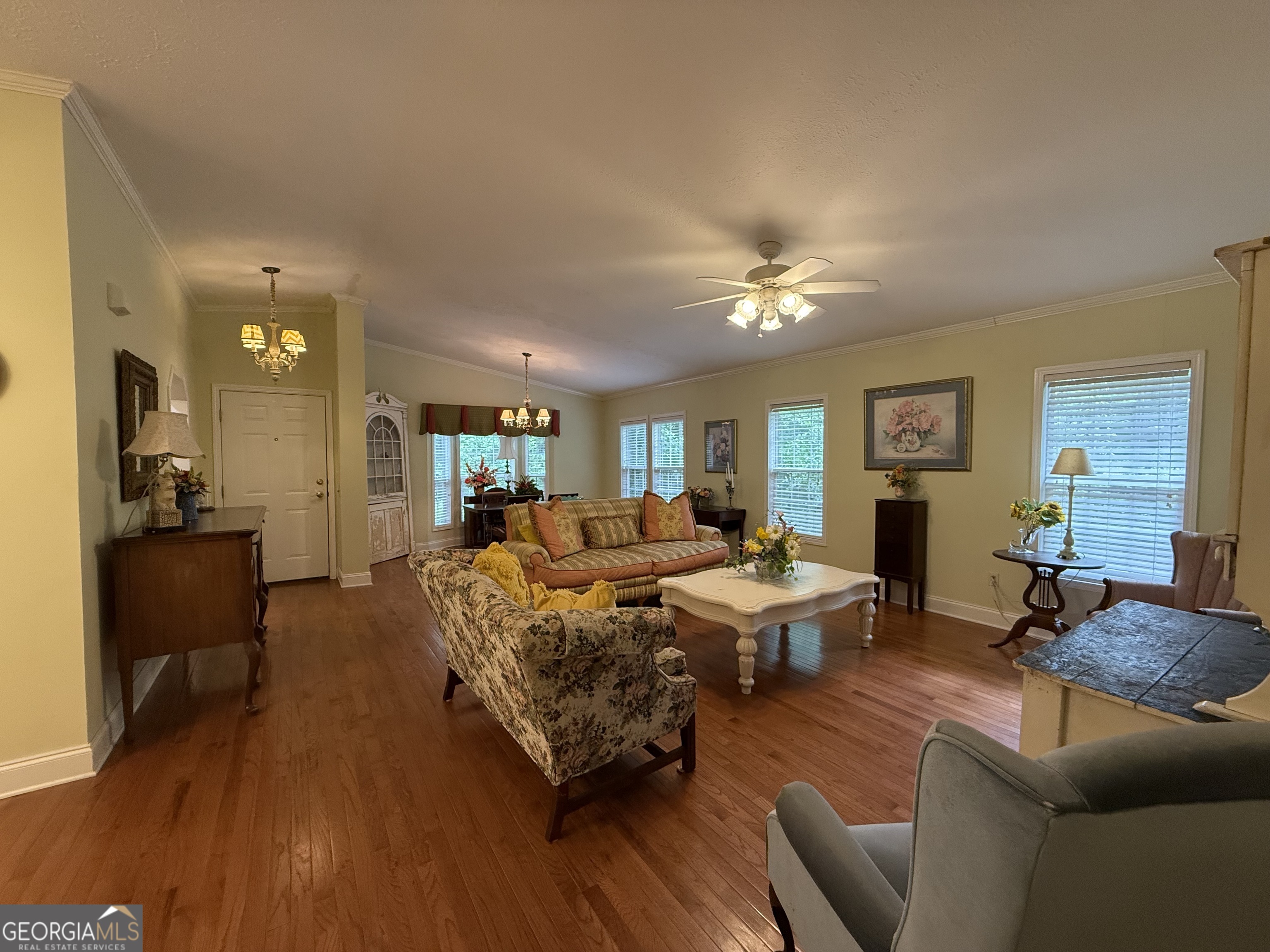 1081 Marshall Church Road Thomson, GA 30824 - Photo 7 of 26 a living room with furniture and wooden floor