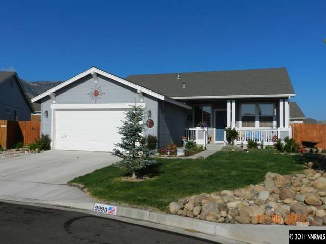 9990 Moondust Court Reno, NV 89506 - Photo 1 of 1 a front view of a house with a yard garden and outdoor seating