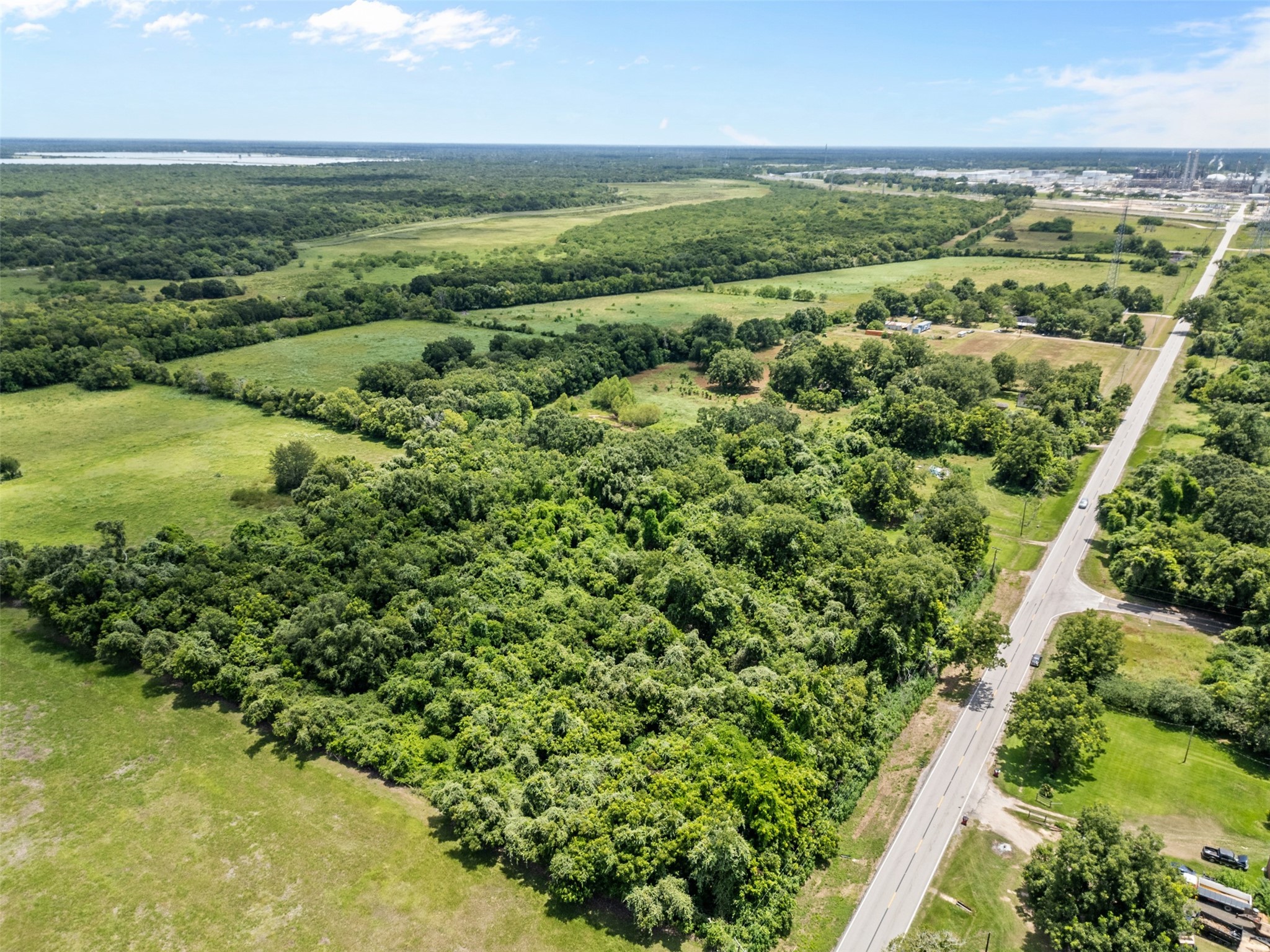 302 Farm To Market 524 Road Sweeny, TX 77480 - Photo 5 of 6 a view of a field with an ocean