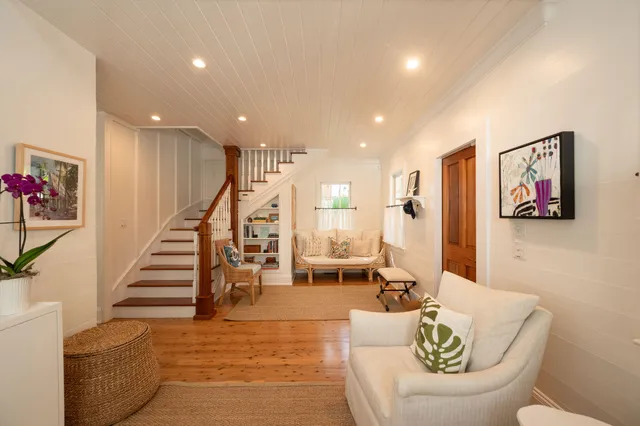 a kitchen with stainless steel appliances kitchen island granite countertop a stove and a refrigerator