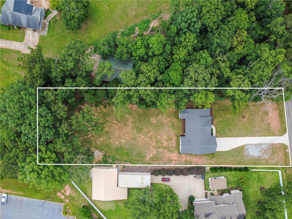 3080 McGee Road Iva, SC 29655 - Photo 43 of 49 An aerial perspective reveals a secluded estate nestled within a verdant, expansive property.