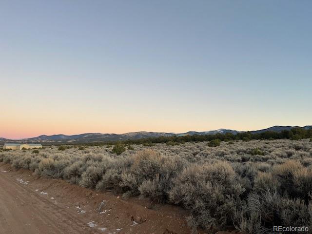 Lot 938 Bateman Road Fort Garland, CO 81133 - Photo 5 of 10 a view of a mountain range with trees