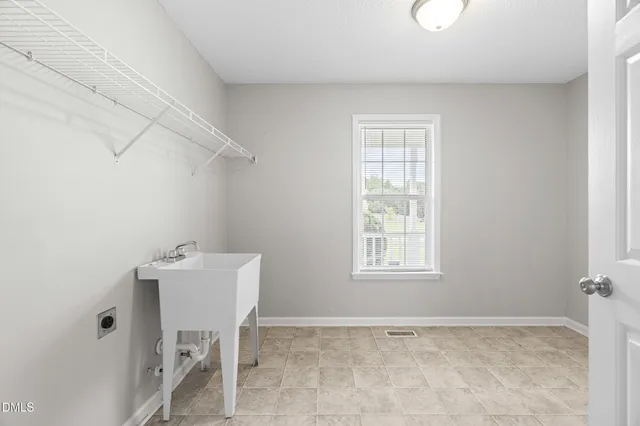 a view of a room that has a window in it