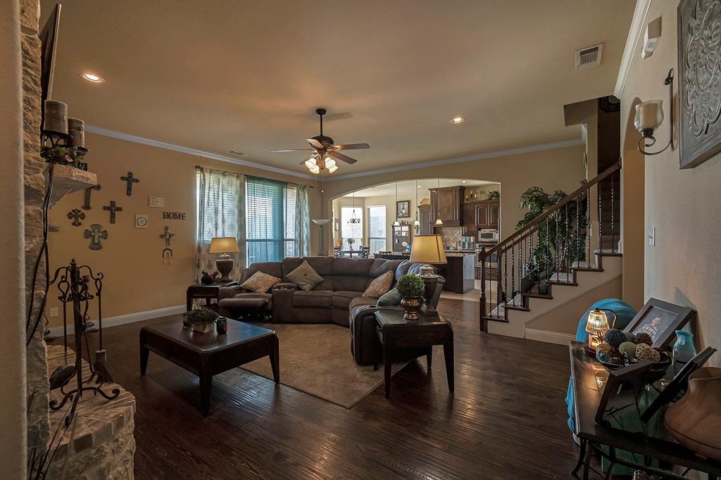 3206 Meadow Ridge Drive Midlothian, TX 76065 - Photo 18 of 37 a living room with furniture and wooden floor