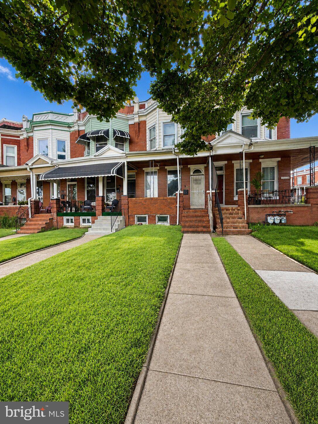 2960 Harford Road Baltimore, MD 21218 - Photo 4 of 20 Charming row homes with lush greenery.