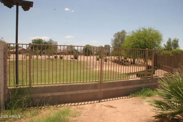a view of a swimming pool with a garden