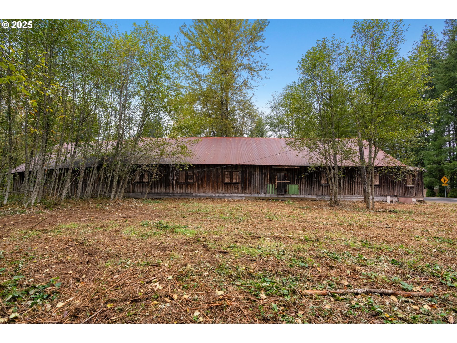 0 Northeast Yale Bridge Road Amboy, WA 98601 - Photo 12 of 28 a backyard of a house with table and chairs