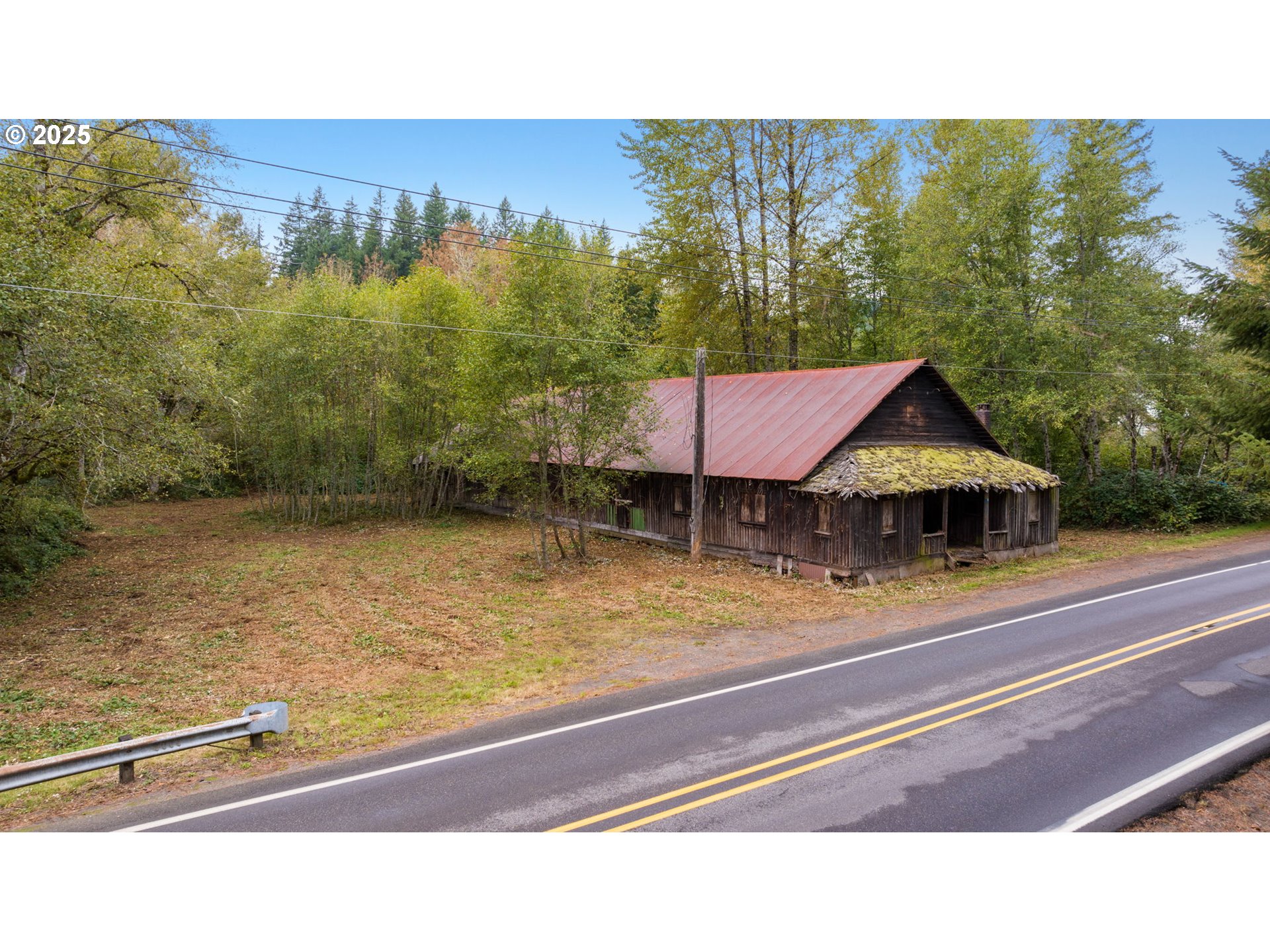 0 Northeast Yale Bridge Road Amboy, WA 98601 - Photo 19 of 28 a view of a house with a balcony