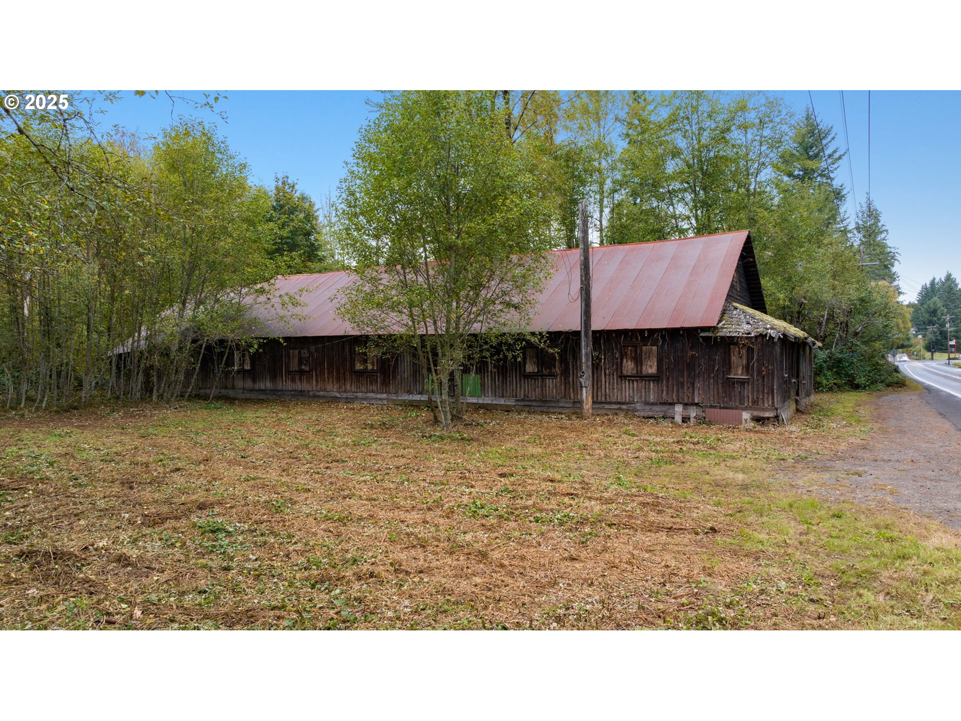 0 Northeast Yale Bridge Road Amboy, WA 98601 - Photo 10 of 28 a backyard of a house with table and chairs