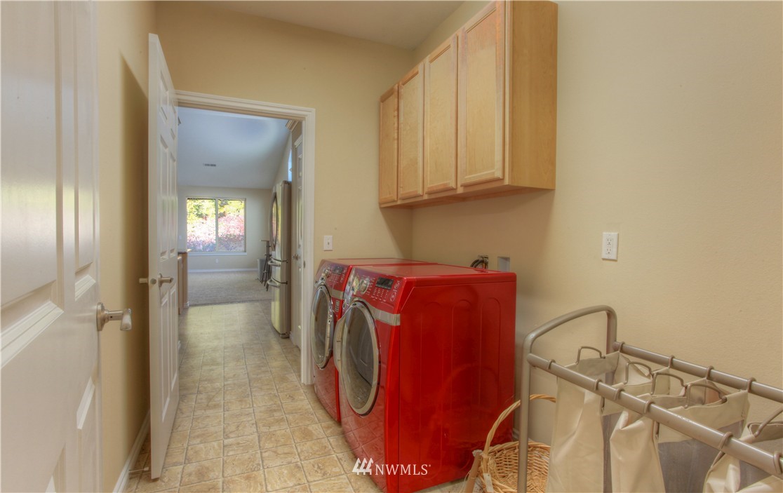 51 Pinehurst Loop Sequim, WA 98382 - Photo 14 of 24 a utility room with dryer and washer