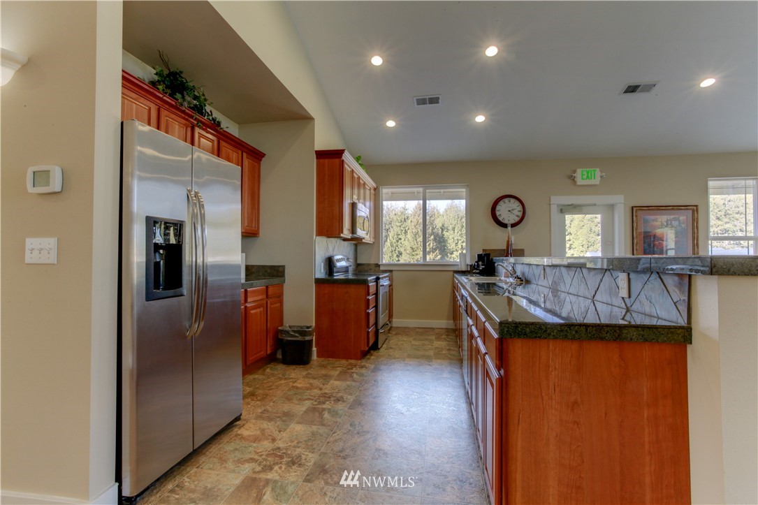 51 Pinehurst Loop Sequim, WA 98382 - Photo 18 of 24 a view of a kitchen and a window