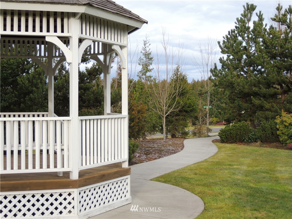 51 Pinehurst Loop Sequim, WA 98382 - Photo 22 of 24 a view of a brick house with a large window