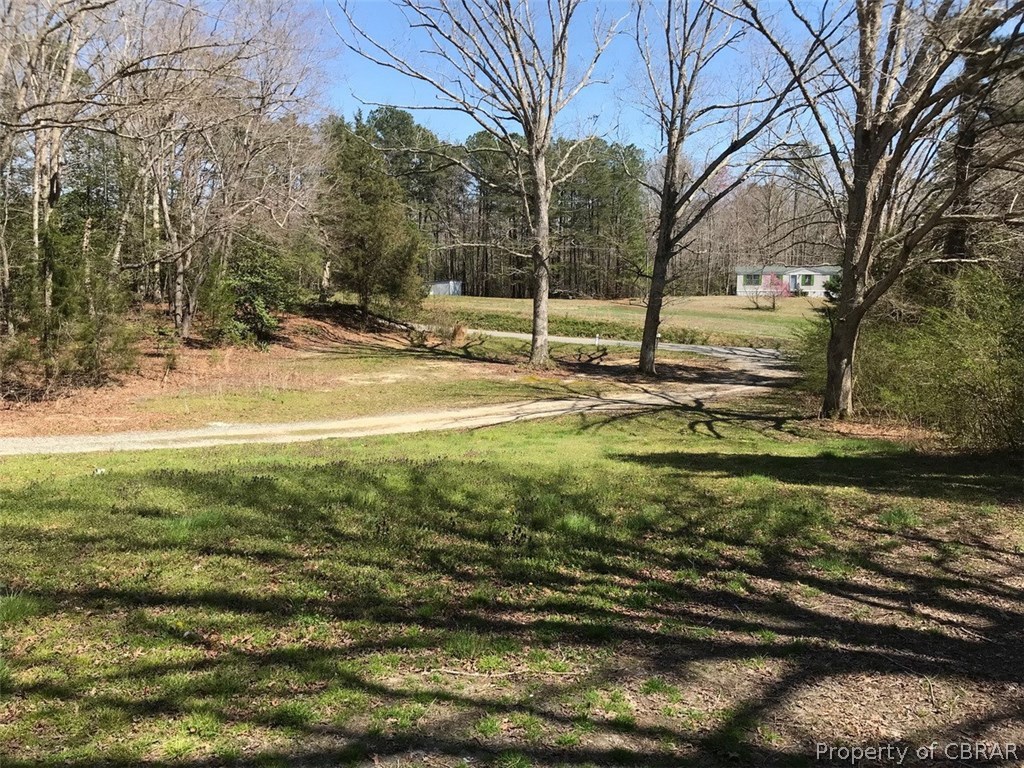 1357 Healys Road Locust Hill, VA 23092 - Photo 3 of 13 Gently sloped front yard