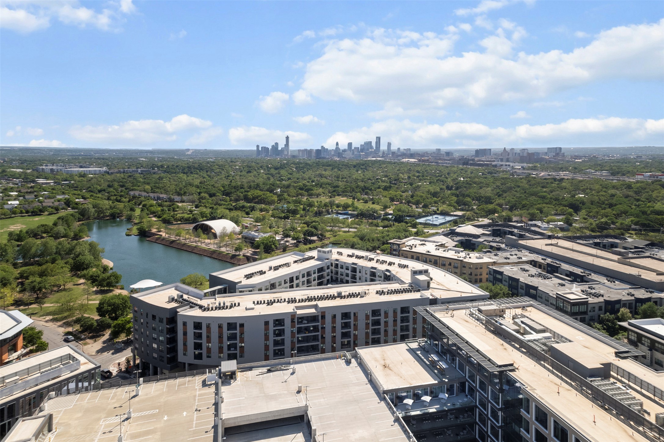 1701 Simond Avenue, Unit 418 Austin, TX 78723 - Photo 32 of 37 Bird's eye view featuring a water view and a city view.