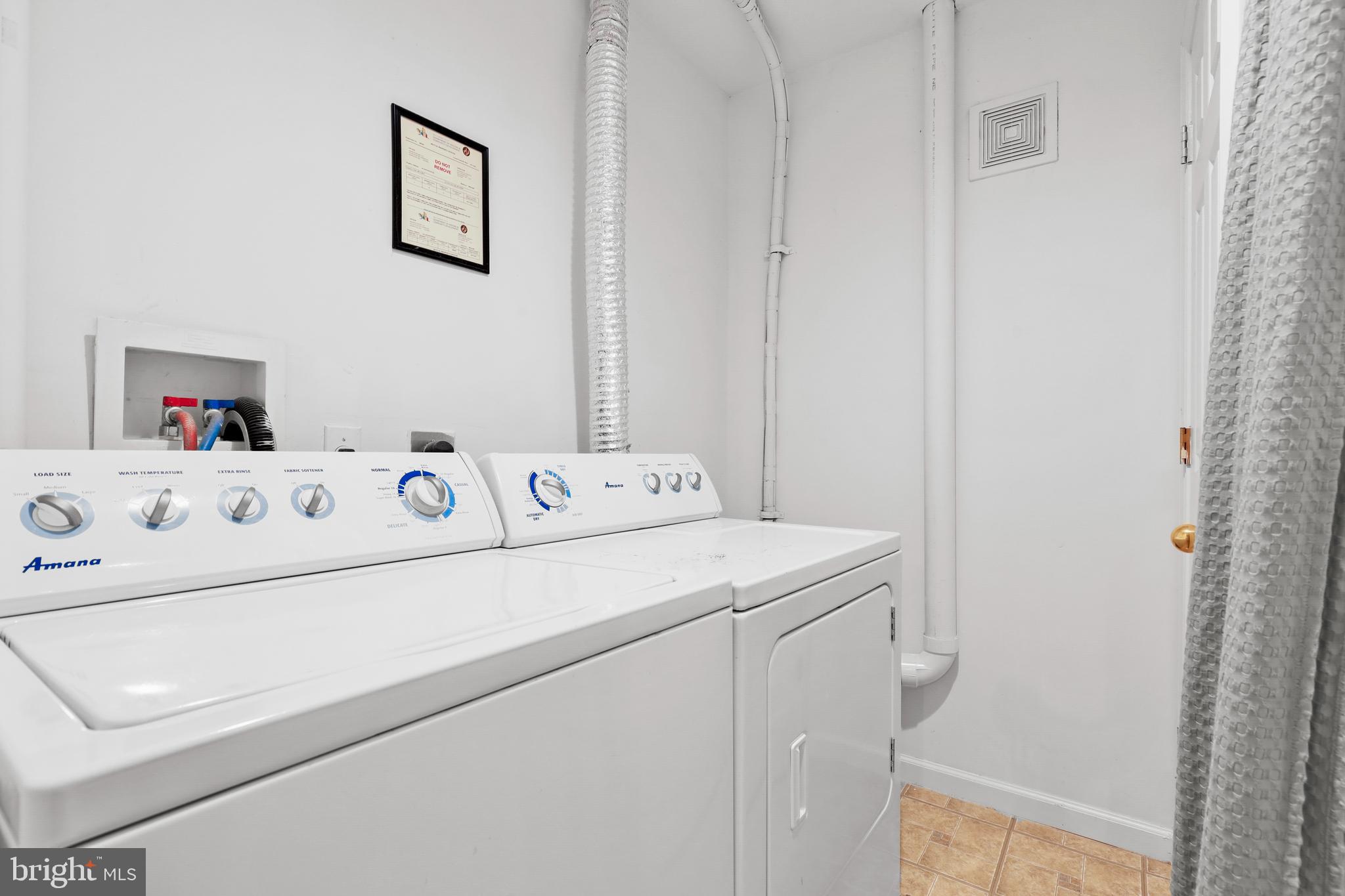 437-439 &445 Kenneth Square Baltimore, MD 21212 - Photo 19 of 40 a utility room with dryer and washer
