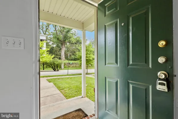 a view of a door and a window