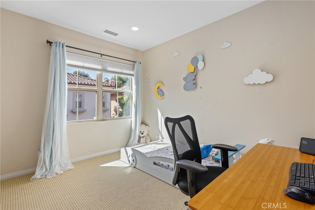 110 Blaze Irvine, CA 92618 - Photo 23 of 28 a view of a workspace with furniture and a window