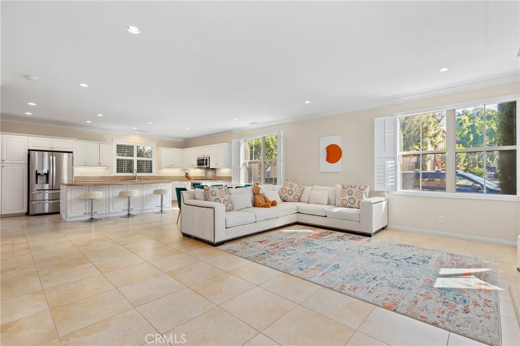 110 Blaze Irvine, CA 92618 - Photo 6 of 28 a living room with furniture and a table