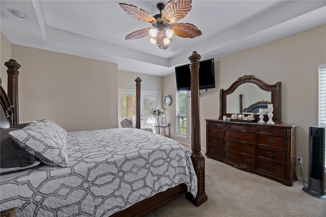 173 David Sandia, TX 78383 - Photo 15 of 40 Primary bedroom with French doors to the lake